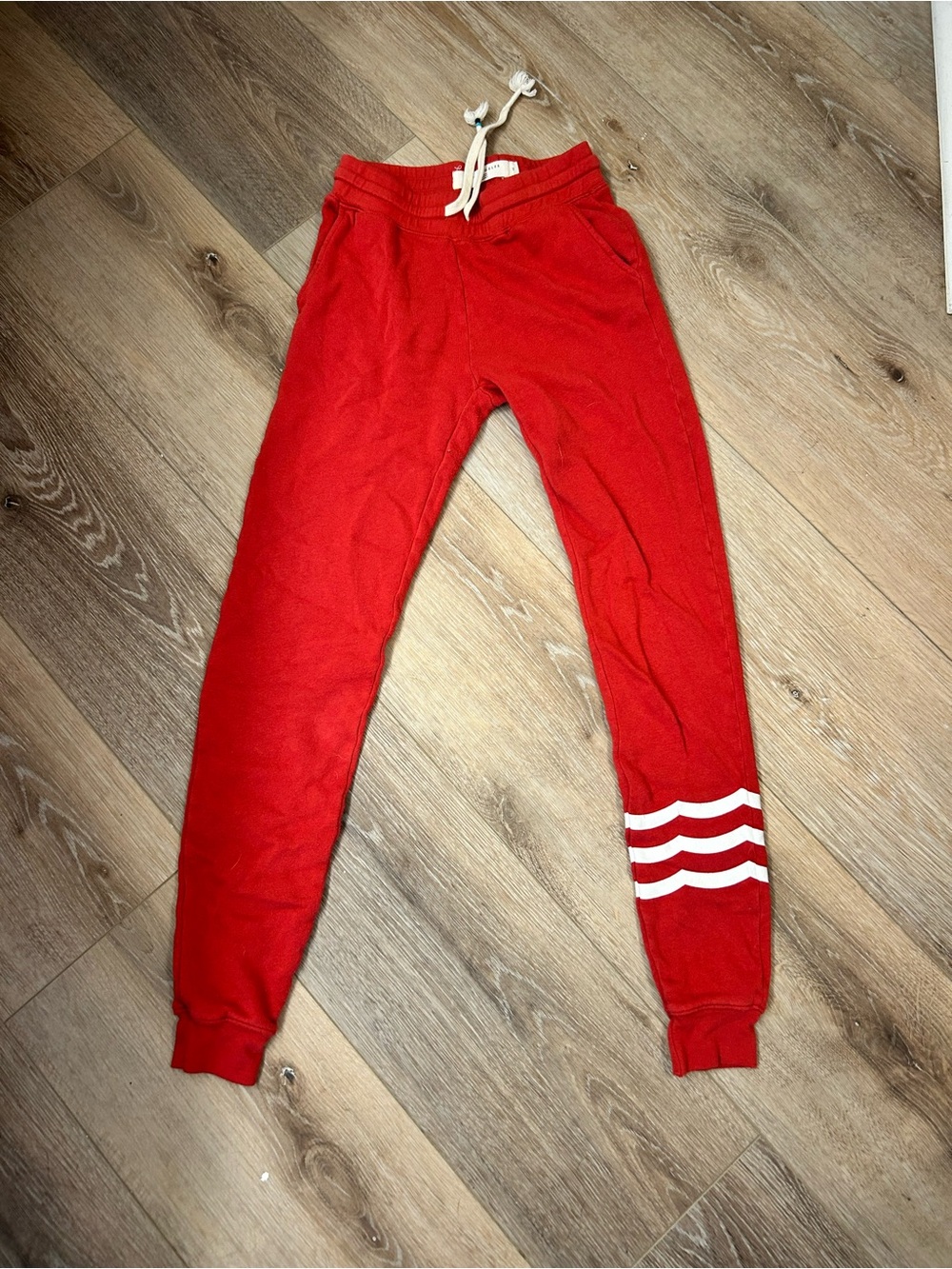 Sol Angeles Women’s Red Jogger Sweatpants with White Stripe Detail
